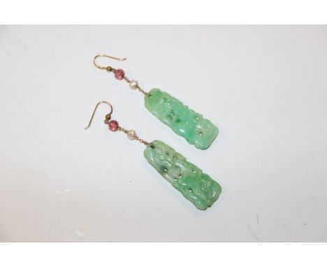 A pair of carved jade type drop ear-rings 