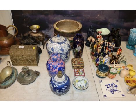 A converted ginger jar to table lamp; one other ginger jar and cover; blue and white fish decorated jar and cover; Oriental j