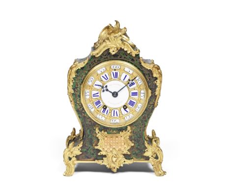 A rare third quarter of the 19th century French boulle-inlaid, gilt brass-mounted mantel clock on a green-stained tortoiseshe