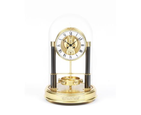 A good and rare late 20th century gilt and patinated brass limited edition 150th Anniversary Atmos clock with original handma