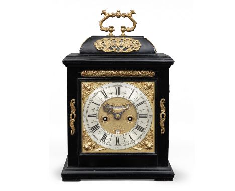 An early 18th century ebonised table clock with trip repeat and internal rack strikingJonathan Lowndes LondonThe case surmoun