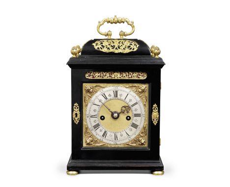 A rare late 17th Century ebony table clock by a Knibb apprenticeJohn Drew, LondonThe case with elaborate foliate handle set w