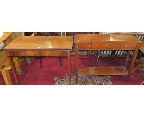 A mahogany side table with single drawer and brass handles, 100cm and a Victorian mahogany fold over card table with moulded 