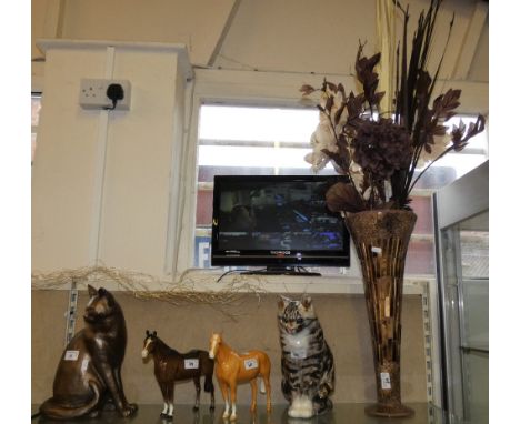 A plaster cast sculpture 'Abigail Cat Looking Back', two Beswick horses, ceramic model of a cat, large flower vase and conten