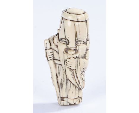 Japanese Edo period ivory netsuke, of a standing figure and long staff, 7cm high