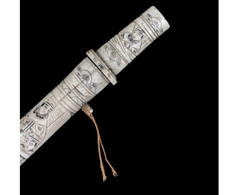 Japanese bone knife, carved to the rip and scabbard as figural scenes, 24cm long