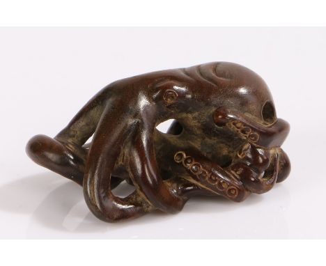 Japanese Edo period boxwood netsuke, 19th Century, Octopus with entwined tentacles with eyes inlaid with horn, 5cm. Provenanc