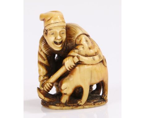 Japanese Edo period ivory netsuke, late 18th Century, Hanasaka-Jiji, a kind old famer digging in the ground guided by his dog