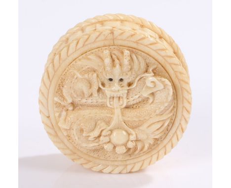 Japanese Meiji period ivory box and cover, carved with a dragon with bead eyes, containing a European compass inset to the bo