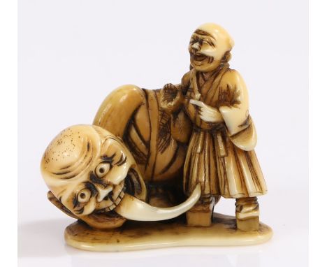 Japanese Meiji period ivory netsuke, goblin menacing a standing figure, signed Shungetsu, 3.5cm. Provenance: Popular Art in I