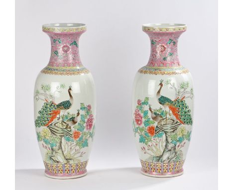 Pair of Chinese Republic period floor vases, with puce foliate decorated waisted necks, the bodies decorated with peacocks in