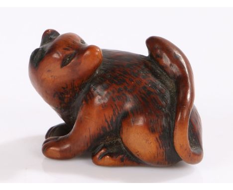 Japanese Edo period boxwood netsuke, 18th Century, fox looking over its shoulder, signed Masanobu, 3.8cm. Provenance: Popular