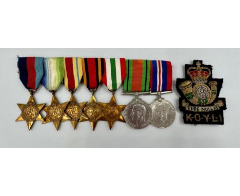 A Multi-Campaign medal group to include The 1939-1945 Star, The Atlantic Star, The Africa Star, The Burma Star, The Italy Sta