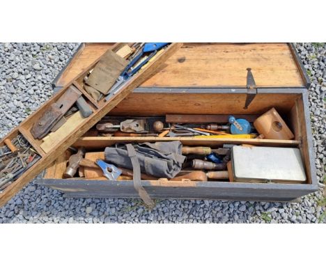 A vintage pine toolbox full of tools. 95cm w x 37cm d x 38cm h. 