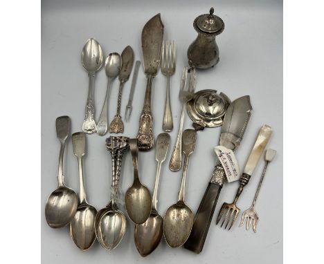 A quantity of silver to include  spoons, Georgian fish fork, butter knife London 1854, maker F.Higgins, broken pepperette etc