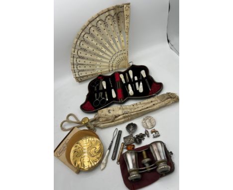 Miscellany comprising cased ladies sewing/manicure set, bone and sequinned fan in original case, Vogue lipstick case, Vanity 