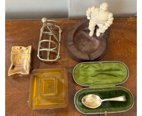 Miscellany to include an original Michelin man Bakelite ashtray, amber glass ashtray, Benson and Hedges crushed packet cerami