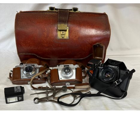 A miscellany to include 2 vintage cased Agfa Silette cameras, a Yashica FX-3 Super camera, a boxed Agfulux-K synchro flash an