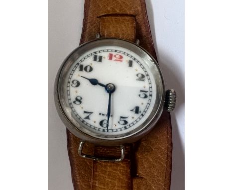 A vintage Numa manual wind trench watch on brown leather strap.Good working order. 
