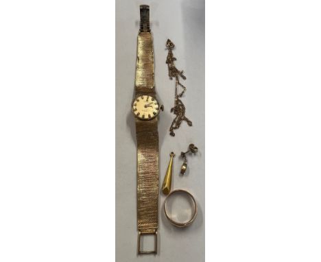 Nine carat gold Tissot watch and strap, gem set ring and unmarked chain and two odd earrings. Total weight 27.1gm. 