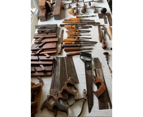 A quantity of vintage tools to include chisels, planes, saws, shoe lasts etc. 