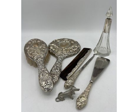 Silver backed mirror, brush and comb set together with EPNS handled button hook and shoe horn, silver topped scent bottle and