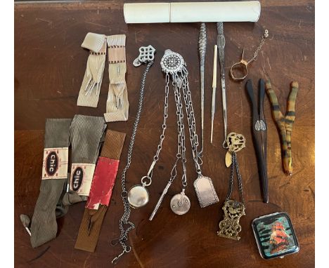 Miscellaneous ladies dress accessories to include chatelaine, silver mounted glove stretchers, compact, button hooks etc. 