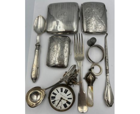 Hallmarked and sterling silver to include three cigarette cases, pocket watch, fork, rattle, thimble, napkin ring, silver han