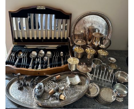 A wooden canteen of cutlery by Joseph Rodgers &amp; Sons Ltd, Sheffield, six place setting, knives and carving set with bone 