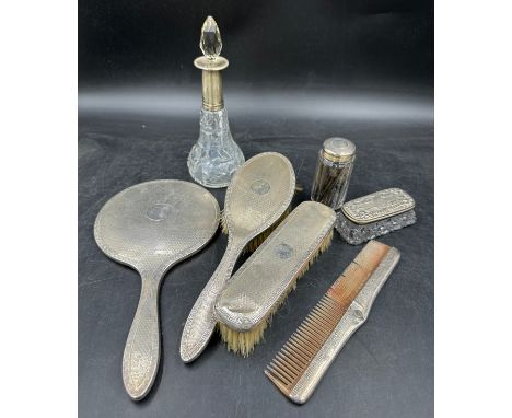 A quantity of silver to include dressing table set comprising of 2 brushes, a mirror and a comb, Birmingham 1928/1929 Walker 