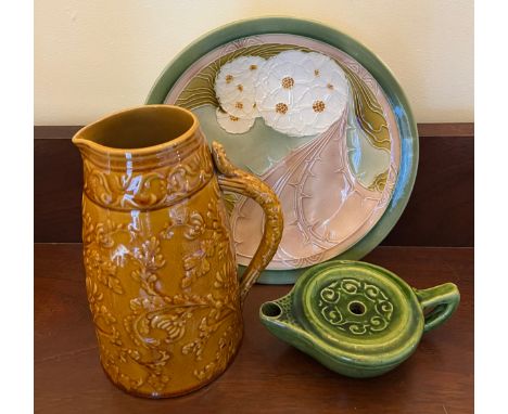 Ceramics to include an Arts and Crafts green glazed pottery oil lamp impressed mark Liberty London, Linthorpe jug 18cm h, Min