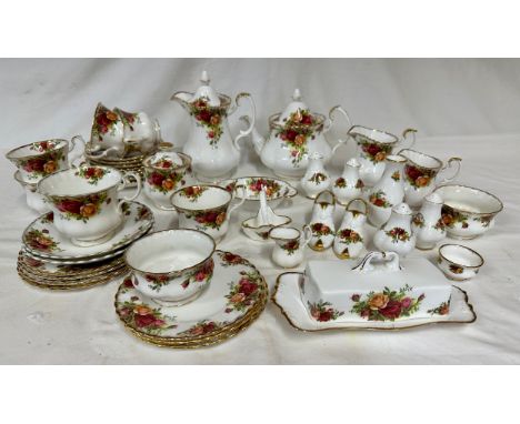 Royal Albert Country Roses. Various items to include: coffee pot 20cm h, teapot 17cm h, 2 x jugs, 2 x sugar, butter dish and 