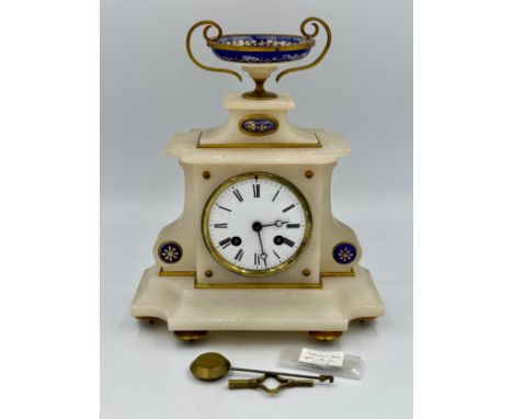 A French marble mantle clock with enamel decoration and movement signed D.C.&amp;.Cie. Key and pendulum. Ticks and goes. 23 c