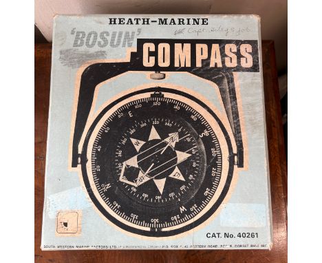 A boxed vintage Heath Marine Bosun compass complete with instructions. Together with a Seafix radio direction finder, Canon z