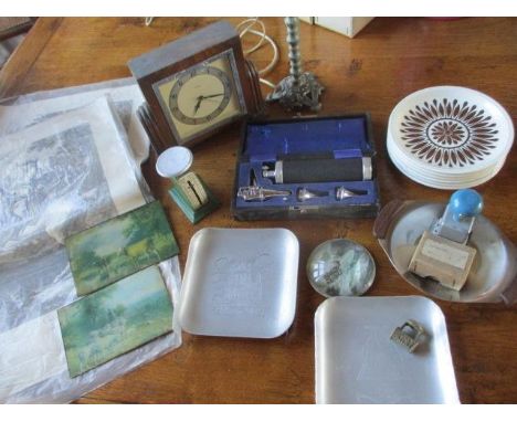 A vintage Goulland auriscope set in original case, a mid 20th century oak cased Smiths mantle clock in the Deco style and met