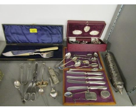 A selection of silver and silver plate to include souvenir enamel spoons, an American silver ladle and other items 