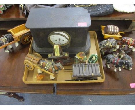 A black slate mantle clock, A/F, mixed mid 20th century ornaments to include work horses and carts and a quantity of drinking