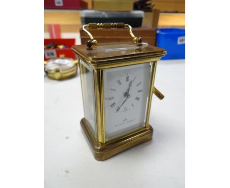 A Matthew Norman brass carriage clock