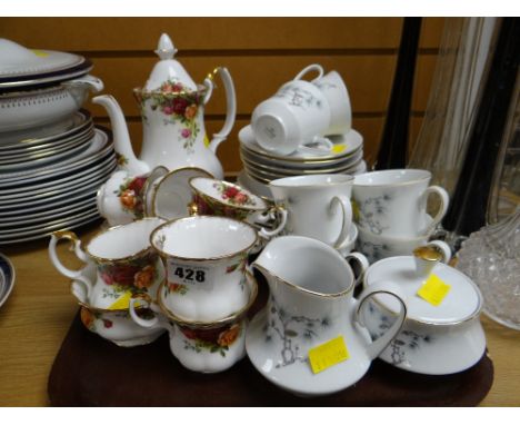 Royal Albert 'Old Country Roses' teaset together with a vintage West German decorated teaset
