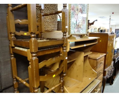 A parcel of furniture to include a pine effect computer desk, a pair of oak rush seated ladder back stools, firescreen