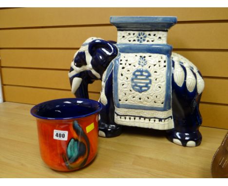 A Chinese ceramic elephant stool & a Poole pottery planter