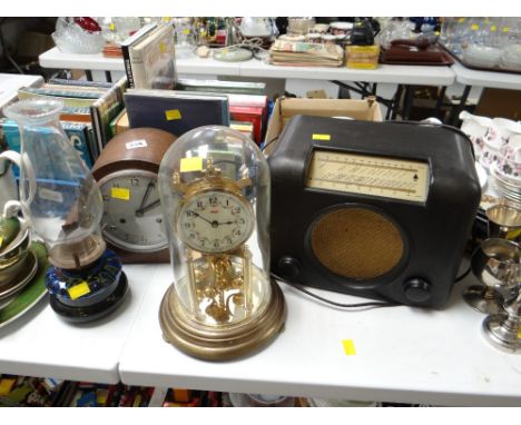 A vintage oak dome topped mantel clock, glass domed clock, vintage Bakelite-style radio etc