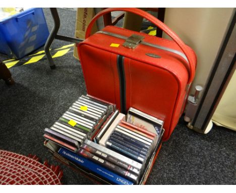 A collection of mainly classical CDs with some DVDs & a vintage red Antler overnight case