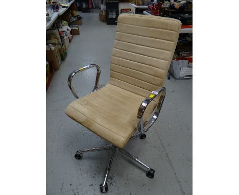 A modern chrome & light suede office chair