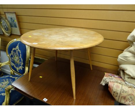 A circular Ercol coffee table