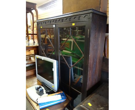 A vintage oak mahogany astragal glazed raised bookcase