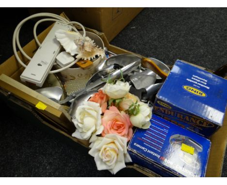 Box of various household items including shoe stretchers, torch, Polaroid instant camera etc