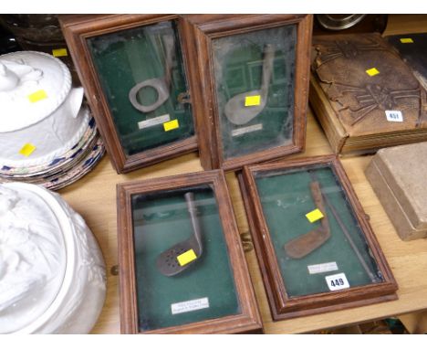 Four vintage cased for mounting golf club heads