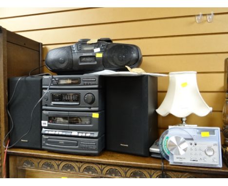 A parcel of electricals to include a Panasonic hi-fi system, Panasonic cassette player, Hitachi CD/clock/radio etc E/T