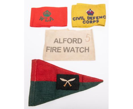 A red over green triangular car pennant, mounted on each side with embroidered patch of the 43rd Gurkha Lorried Infantry Brig